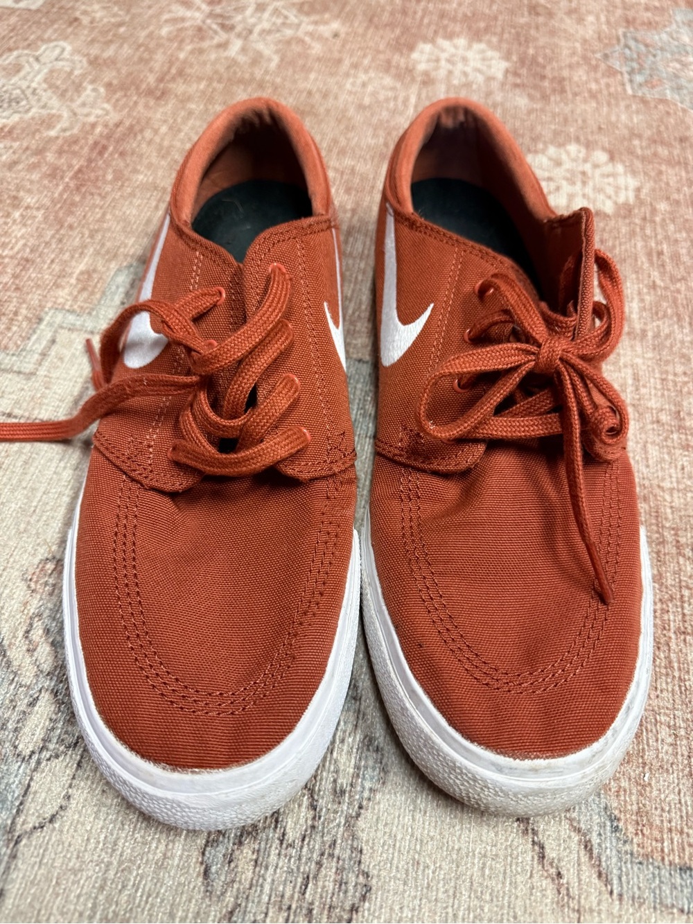 Nike Rust Orange Canvas Low-Top Sneakers with White Swoosh